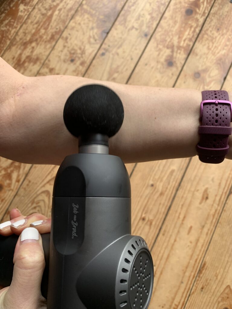 review of a massage gun by ultra runner